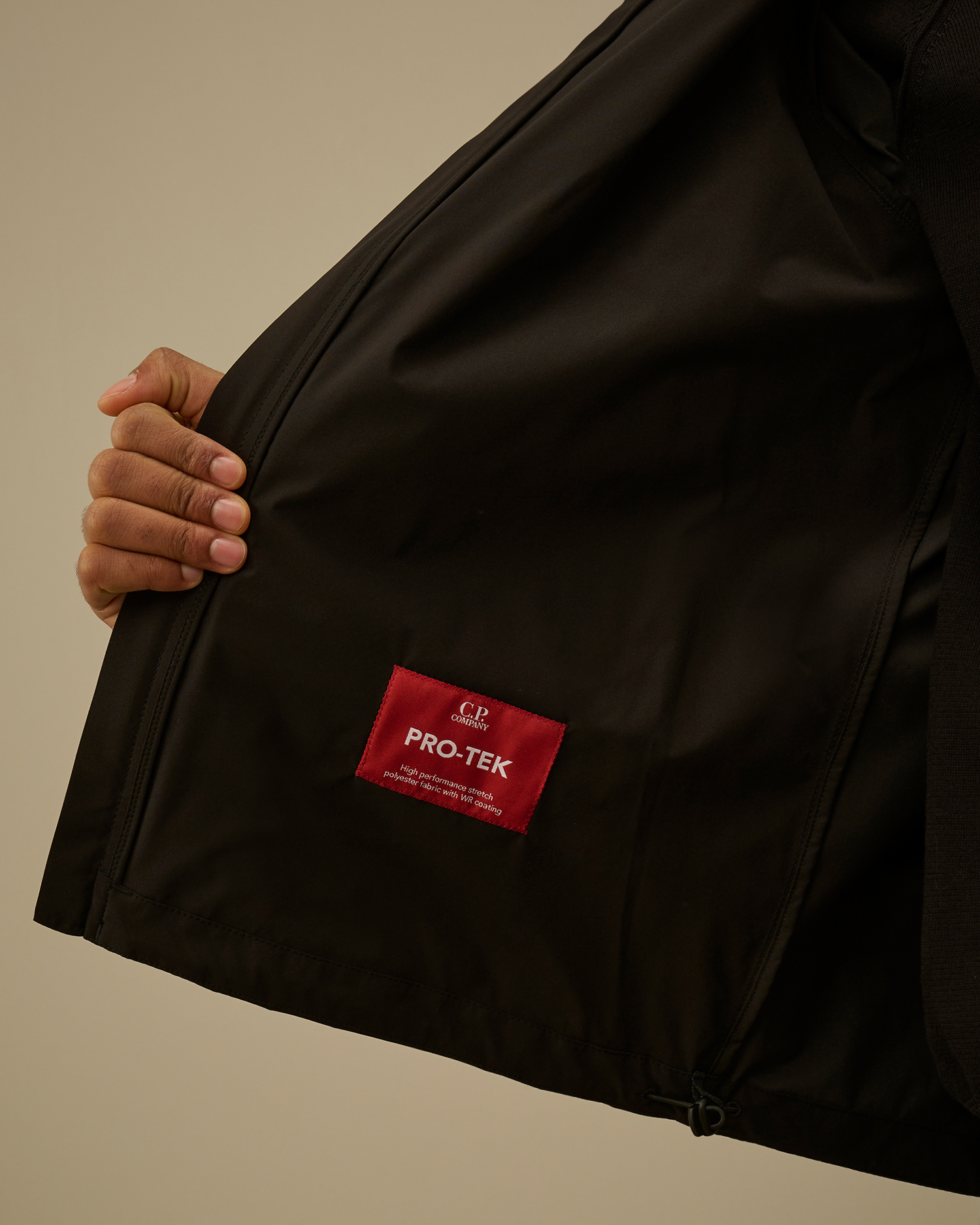 Black Pro-Tek Hooded Lens Jacket | CPC USCA Online Store