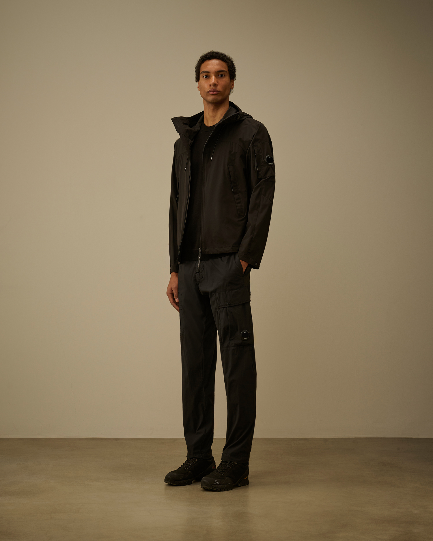 Black Pro-Tek Hooded Lens Jacket | CPC USCA Online Store