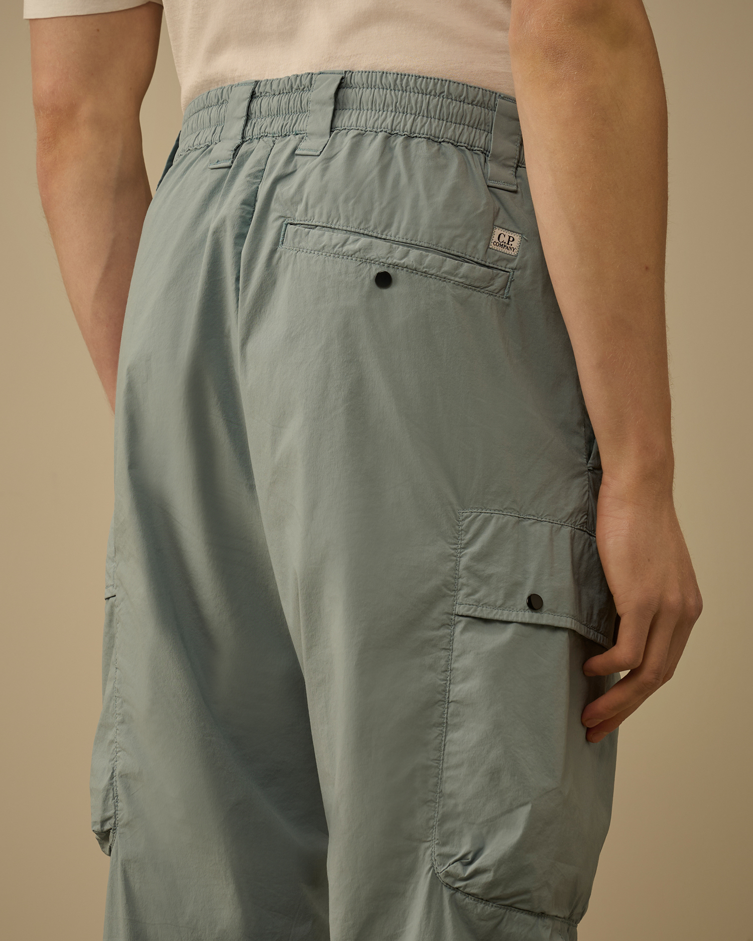 CP COMPANY ナイロン カーゴパンツ 水色M Light-blue 50 Fili Stretch Elasticated Lens Cargo Pants | CPC JP